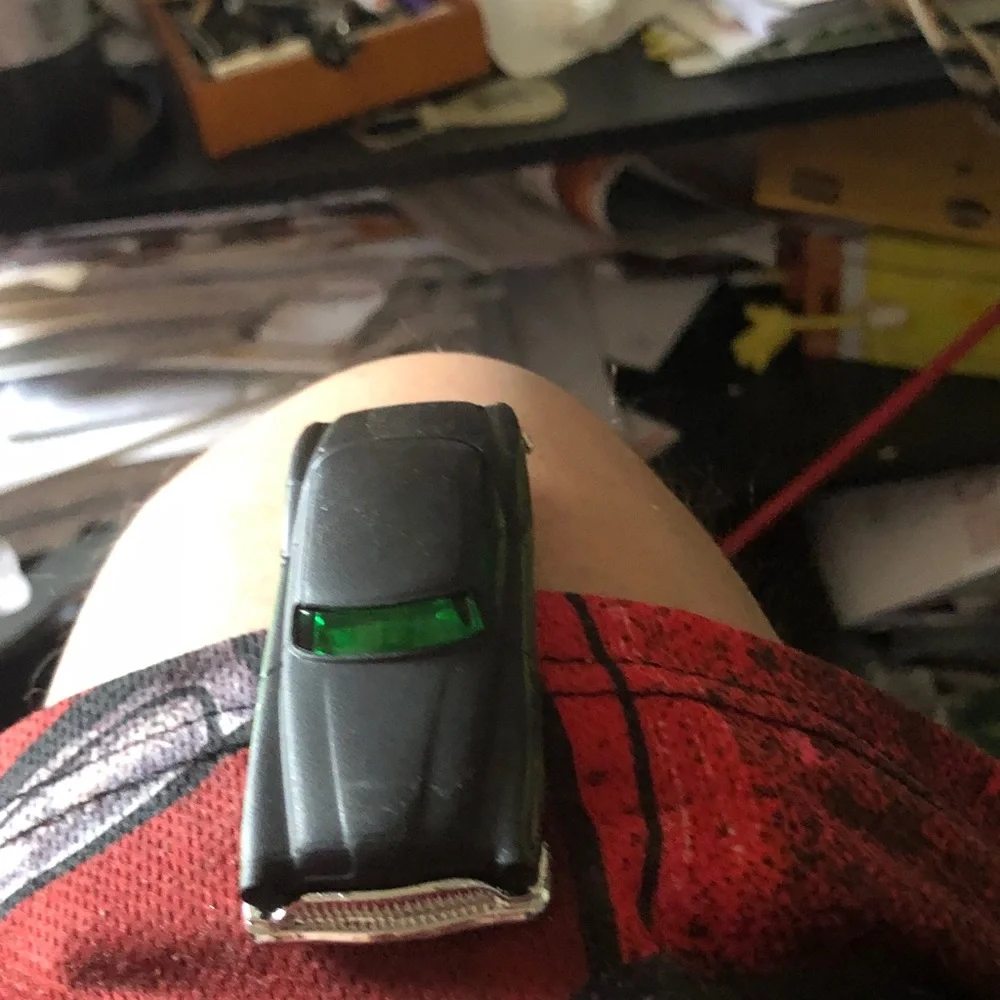 Black Die-Cast Toy Car with Green Windshield